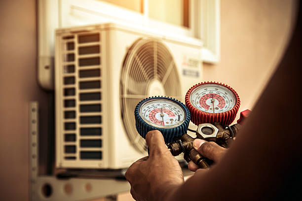 Professional Heat Pump Repair technician working in Corydon, IN